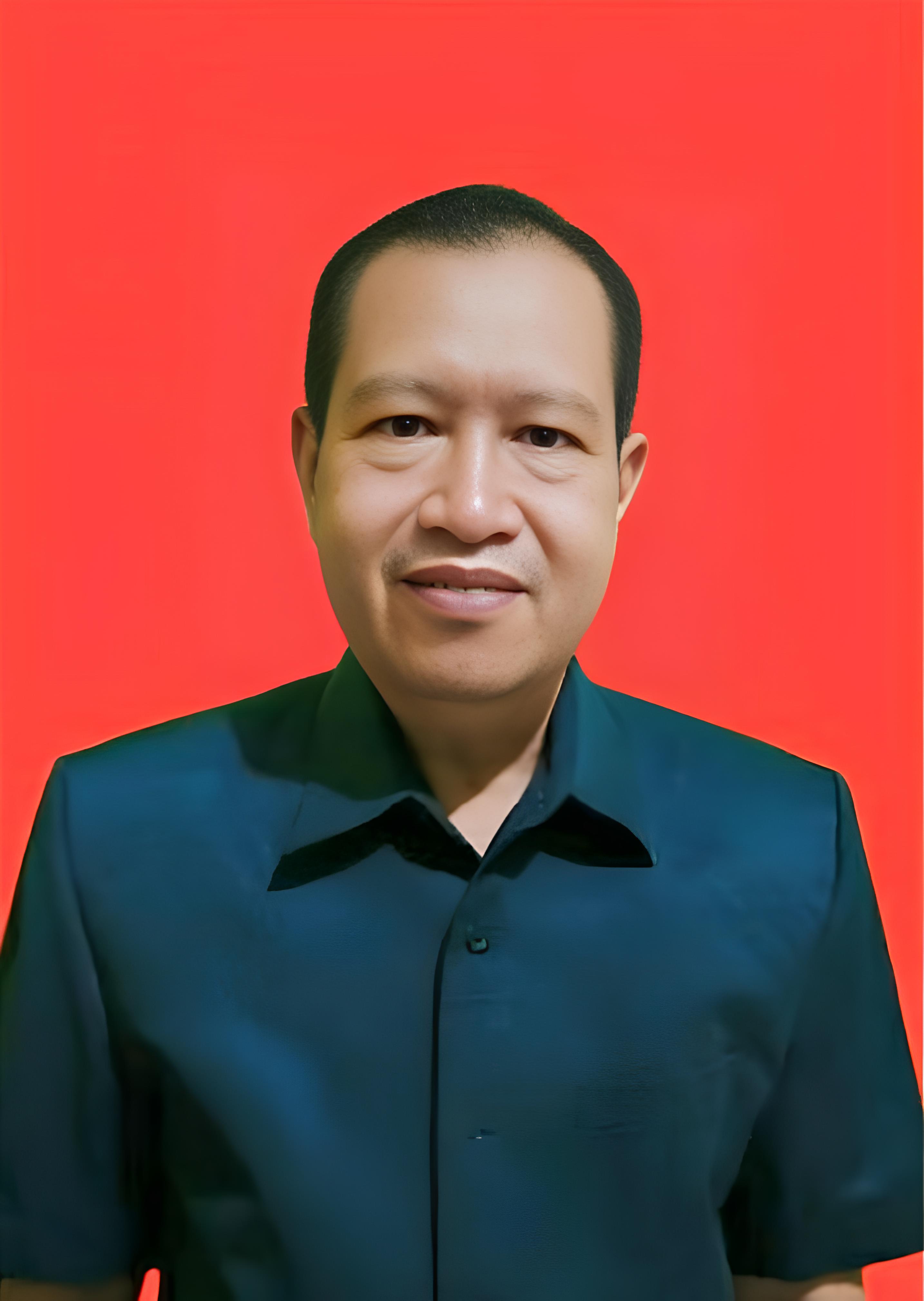 Drs. Iksanul Huri, M.H.